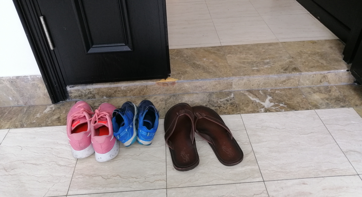 shoes at door Malaysian customers